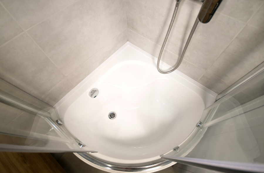 curved shower cabin and shower tray