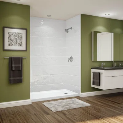 Walk-in shower with white textured wall panels and chrome showerhead in a bathroom with olive green walls