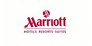Marriott hotels logo with red circular emblem, serif Marriott wordmark and Hotels Resorts Suites tagline