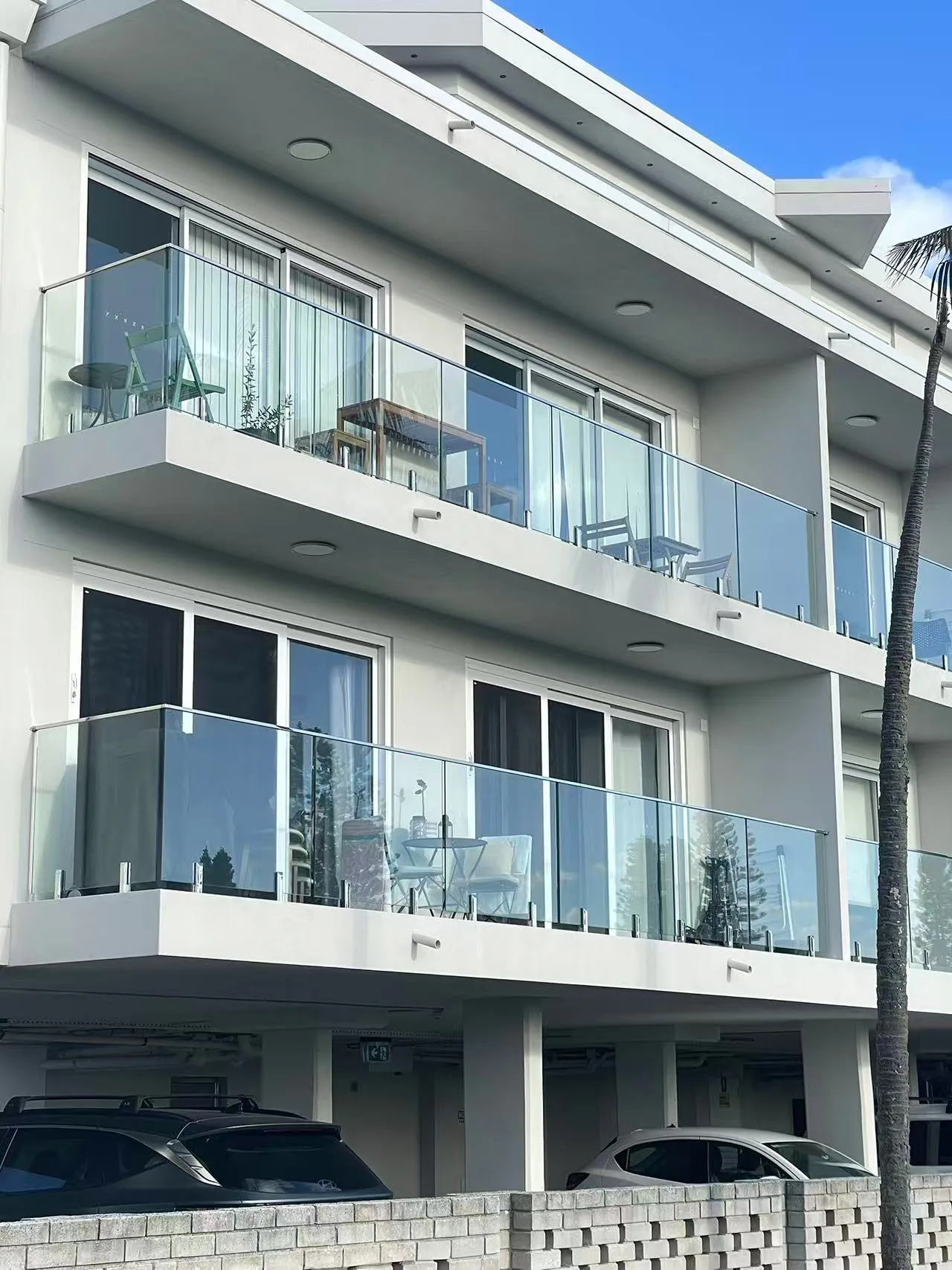 Waterview Beach Apartment balcony railing project photo 3 — glass balustrade with corrosion-resistant hardware for coastal Dee Why, Australia