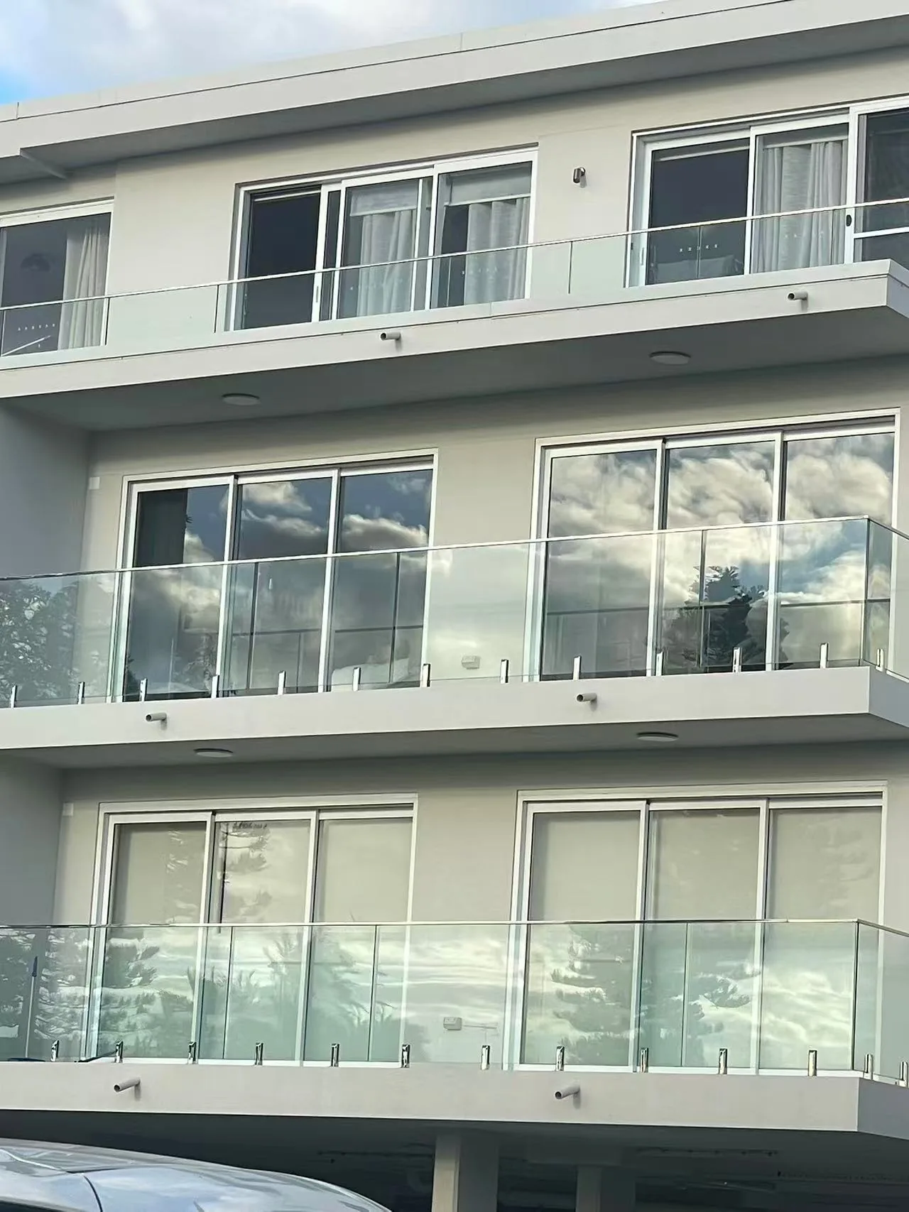 Waterview Beach Apartment balcony railing project photo 4 — glass balustrade with corrosion-resistant hardware for coastal Dee Why, Australia