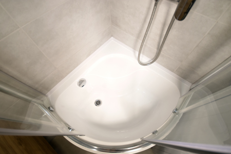 curved shower cabin and shower tray